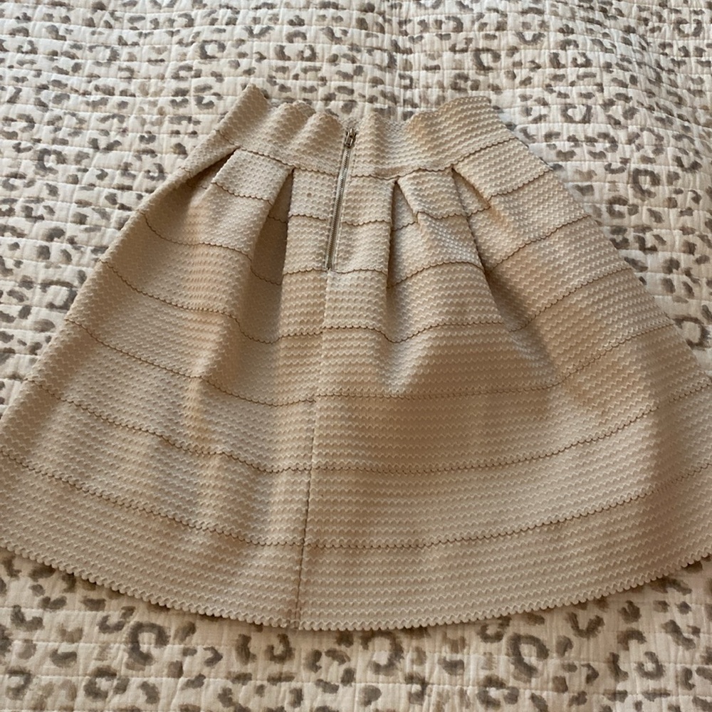 BEBE textured pleated skirt in tan